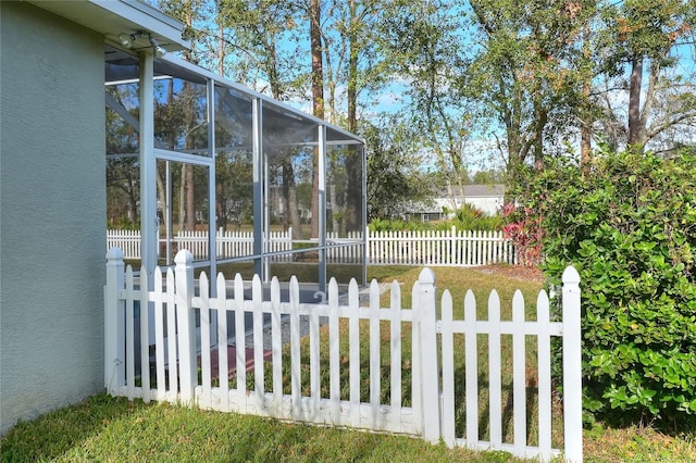 view of yard featuring a lanai