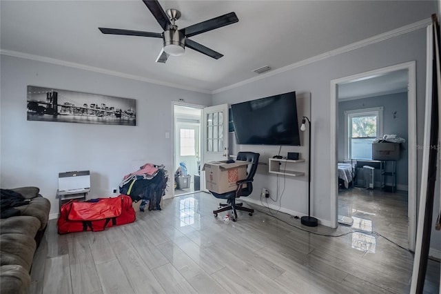 office space with hardwood / wood-style floors, ceiling fan, and crown molding