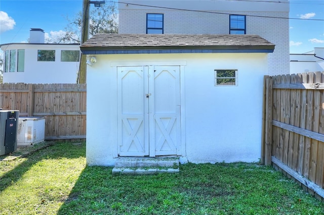 view of outdoor structure with a yard