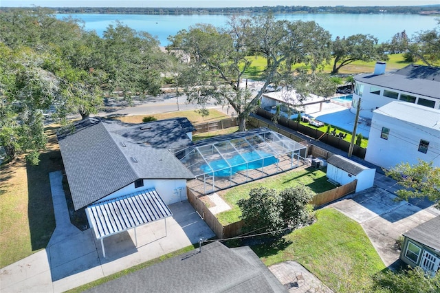 birds eye view of property featuring a water view