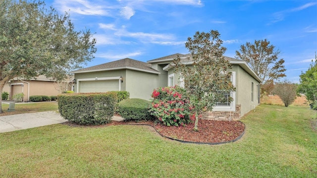 view of front facade featuring a front yard and a garage