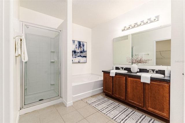 bathroom featuring vanity, tile patterned floors, and plus walk in shower