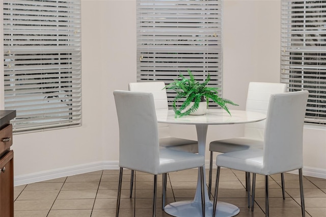 dining room with light tile patterned floors