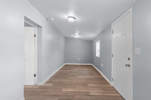 spare room with light hardwood / wood-style floors