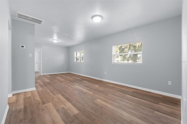 empty room featuring hardwood / wood-style floors