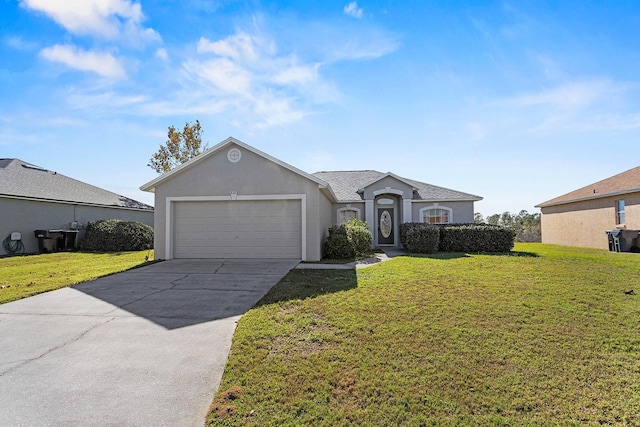 view of front of house featuring a garage and a front lawn