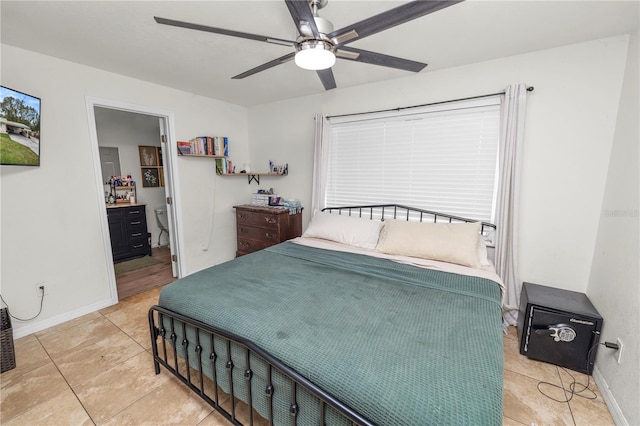 210 Wilder Rd, Lakeland, FL 33809 - bedroom featuring tile patterned flooring, ceiling fan, and ensuite bathroom