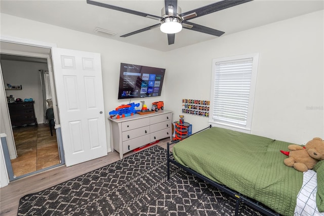 210 Wilder Rd, Lakeland, FL 33809 - bedroom with hardwood / wood-style floors, ceiling fan, and a closet