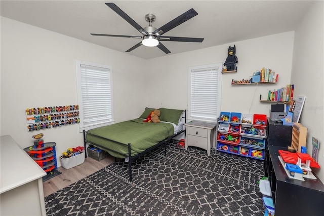 210 Wilder Rd, Lakeland, FL 33809 - bedroom with ceiling fan and dark wood-type flooring