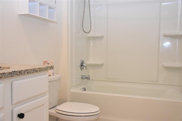 full bathroom with shower / bathing tub combination, vanity, and toilet