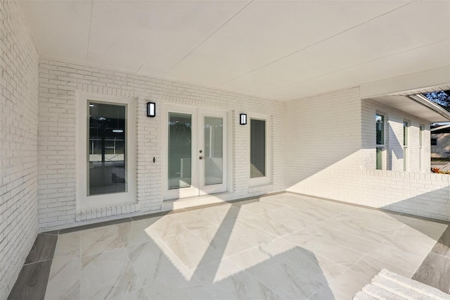 view of patio featuring french doors