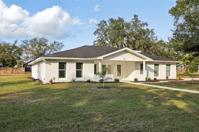 ranch-style house with a front yard