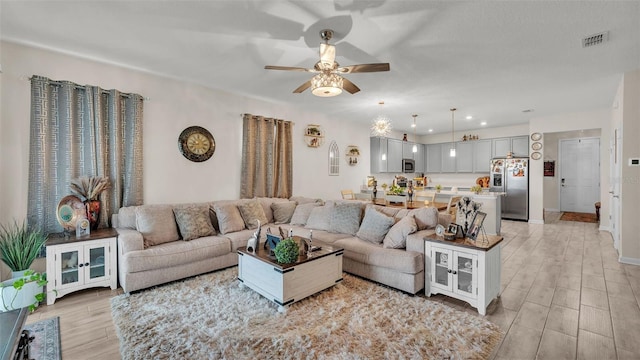 living room with ceiling fan