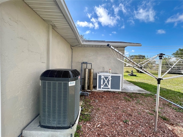 exterior details featuring central AC