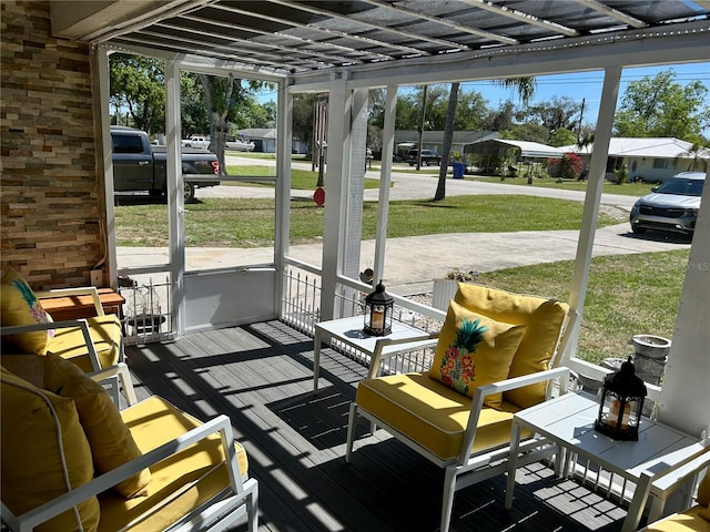 sunroom featuring a healthy amount of sunlight