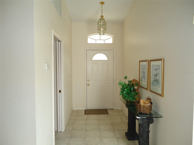 entryway with a towering ceiling