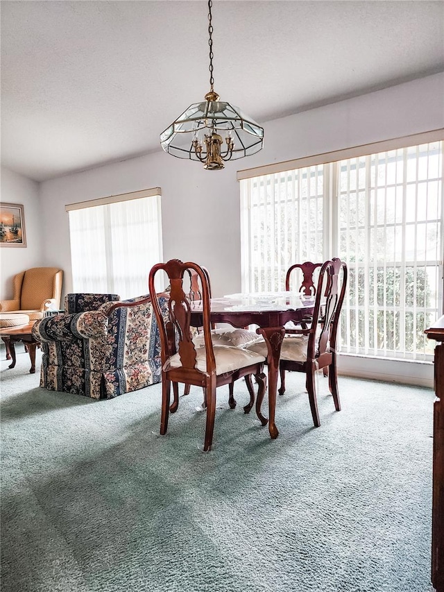 5805 Danterbury Ct, Lakeland, FL 33810 - dining room featuring a notable chandelier and carpet floors