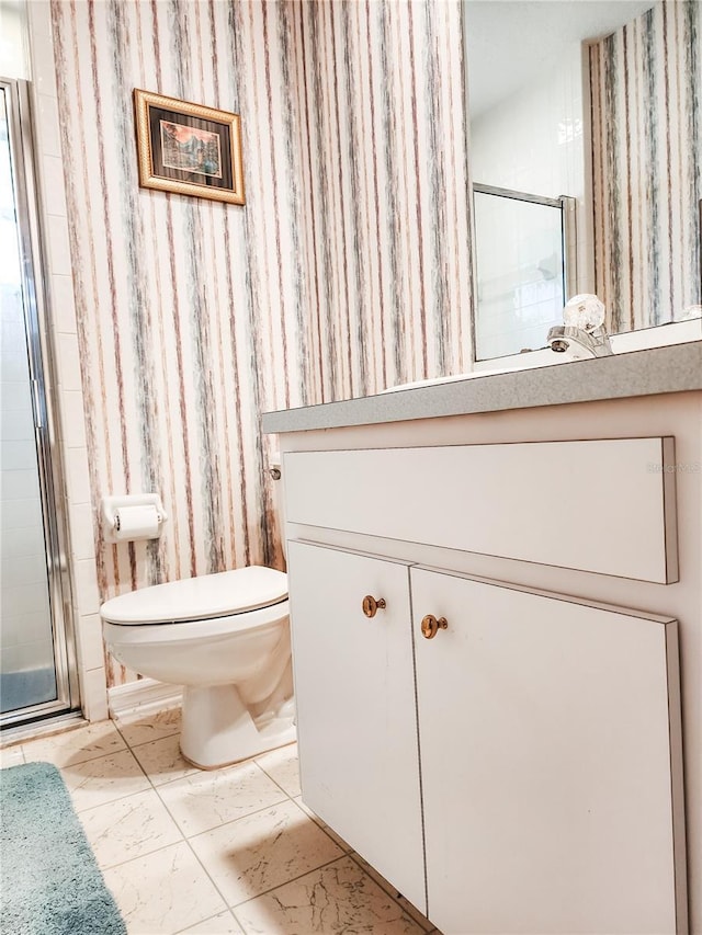 5805 Danterbury Ct, Lakeland, FL 33810 - bathroom with vanity, toilet, and a shower with shower door