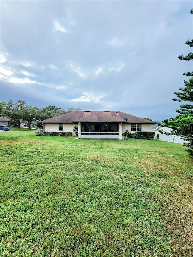 5805 Danterbury Ct, Lakeland, FL 33810 - rear view of property featuring a yard