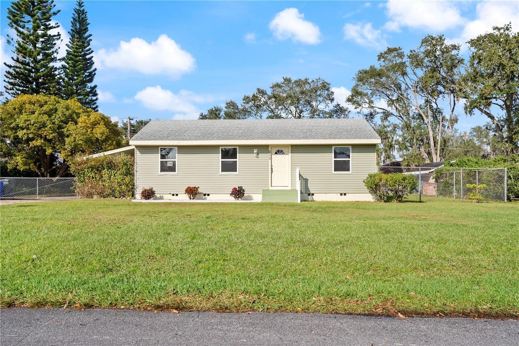 view of front of home with a front yard