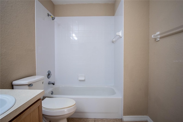 full bathroom featuring tile patterned floors, vanity, toilet, and tiled shower / bath