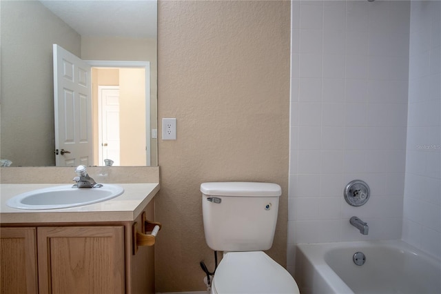 full bathroom featuring shower / washtub combination, vanity, and toilet