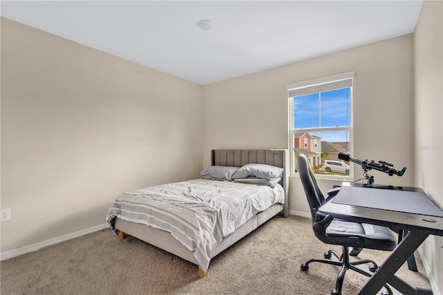 bedroom with light carpet