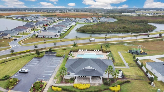 drone / aerial view with a water view