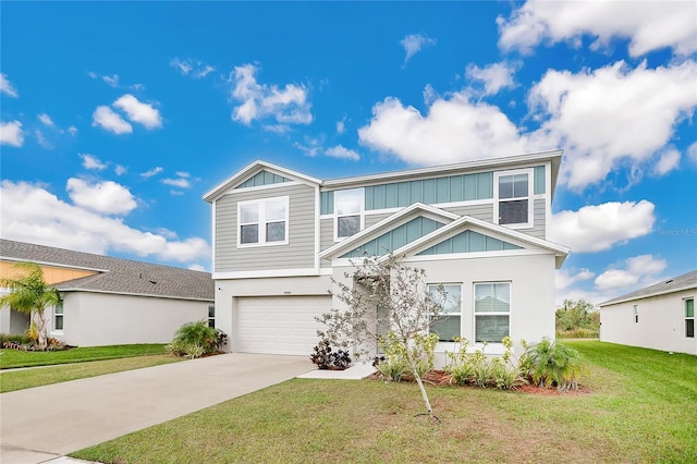 view of front of house featuring a garage and a front lawn