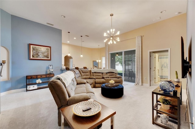 332 Lake Mariana Way, Auburndale, FL 33823 - living room featuring a chandelier, carpet flooring, and recessed lighting