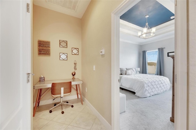 carpeted bedroom featuring a notable chandelier, a raised ceiling, and crown molding