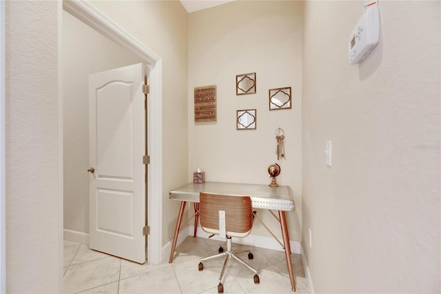 home office featuring light tile patterned flooring