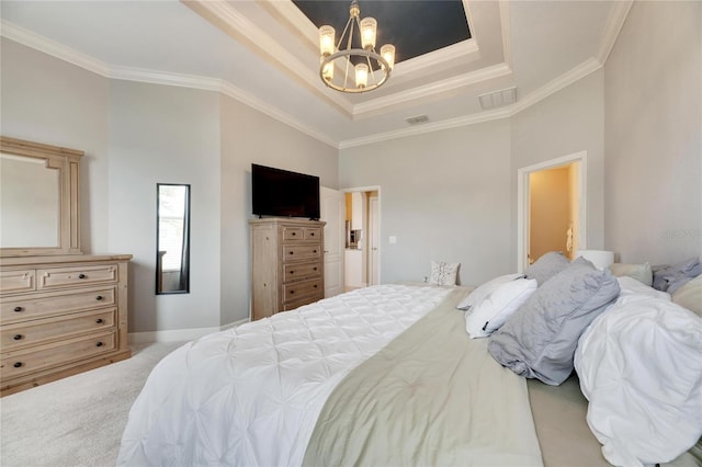 bedroom featuring a towering ceiling, ornamental molding, light colored carpet, a tray ceiling, and an inviting chandelier