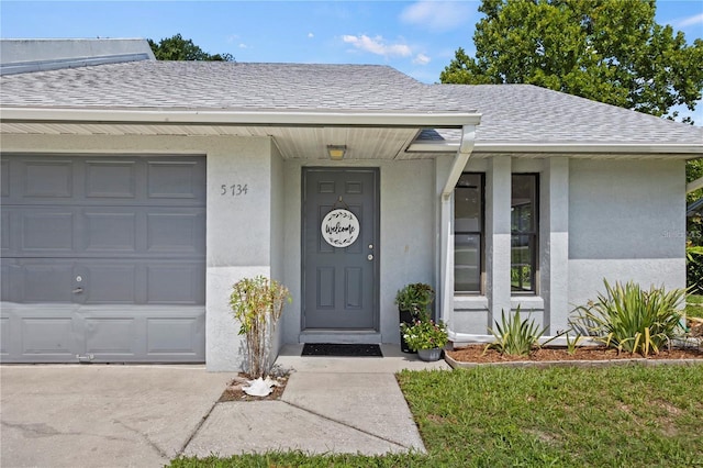 entrance to property featuring a garage