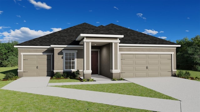 view of front of property featuring a front lawn and a garage