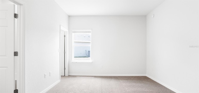 565 SW 77th Cir, Ocala, FL 34474 - spare room with carpet floors and baseboards
