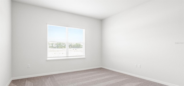 565 SW 77th Cir, Ocala, FL 34474 - empty room featuring carpet floors and baseboards