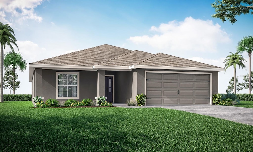 view of front facade featuring a garage and a front yard