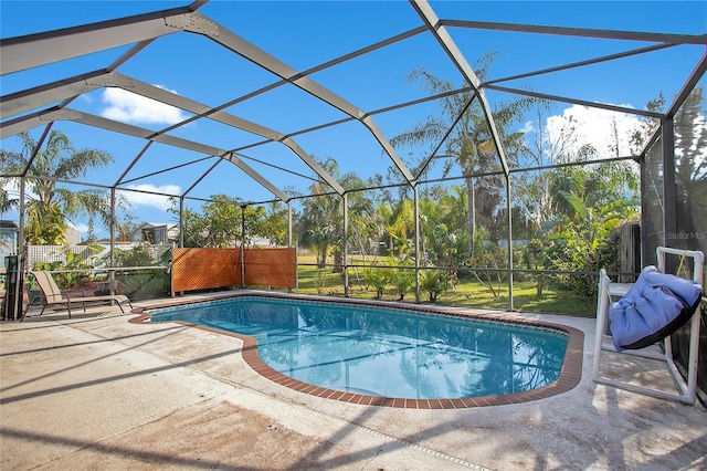 view of pool with a lanai and a patio