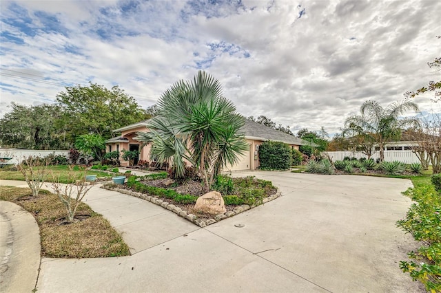 view of front of home with a garage