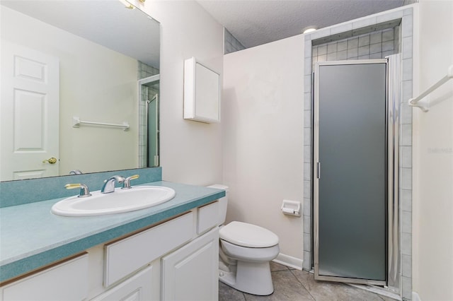 bathroom with tile patterned floors, a shower with door, a textured ceiling, and toilet