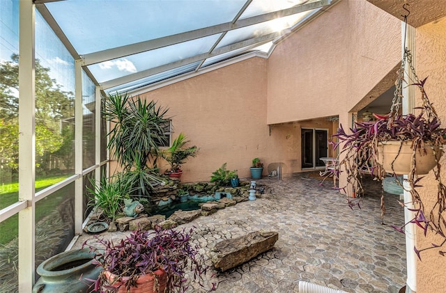 sunroom with lofted ceiling