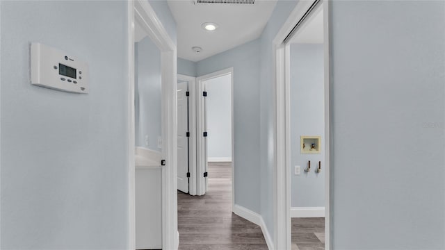 hall featuring dark hardwood / wood-style floors