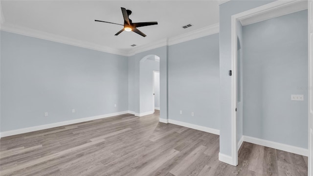 empty room with light hardwood / wood-style floors, ceiling fan, and ornamental molding