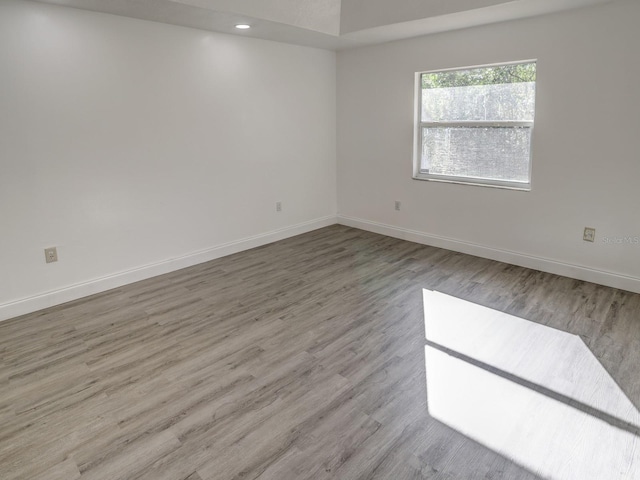 empty room featuring hardwood / wood-style floors