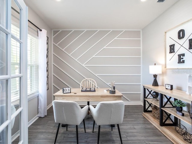 home office featuring a healthy amount of sunlight and dark wood-type flooring