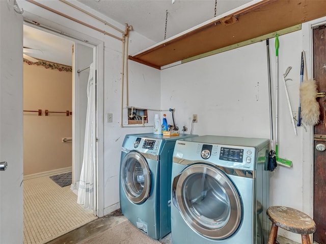 washroom featuring independent washer and dryer