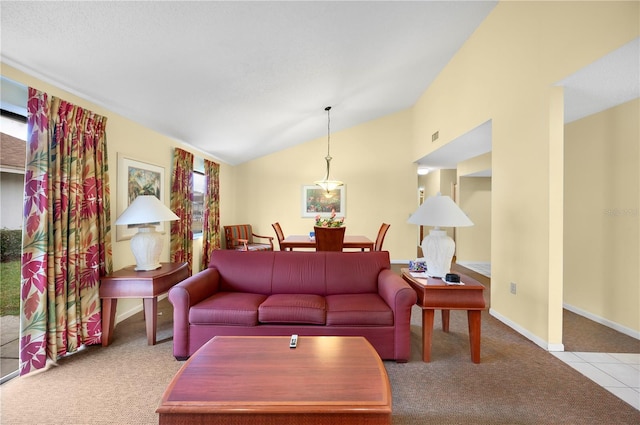 4241 Oak Loop Unit 36, Mulberry, FL 33860 - living room with light colored carpet and lofted ceiling