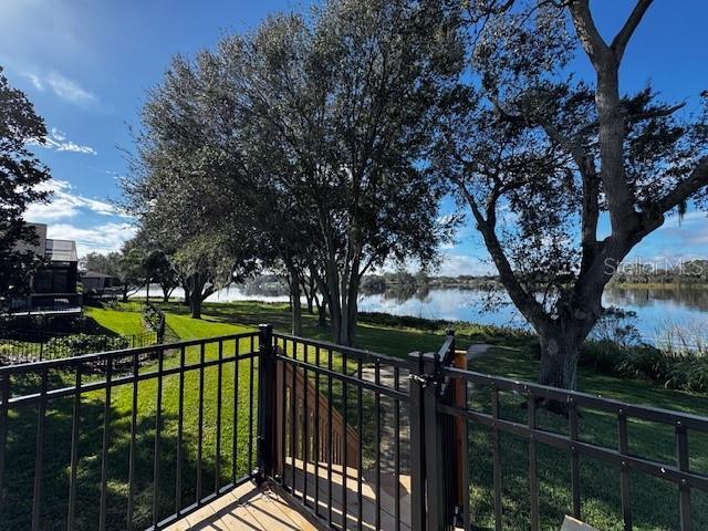 balcony featuring a water view