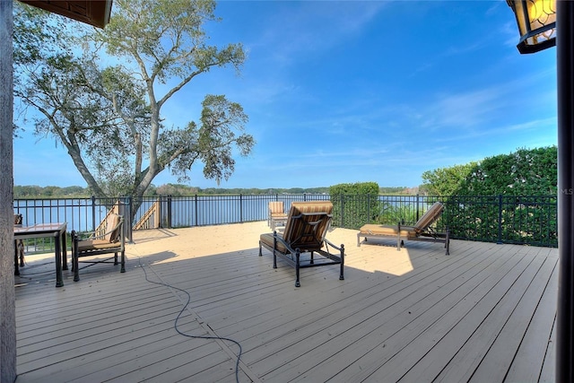 deck featuring a water view